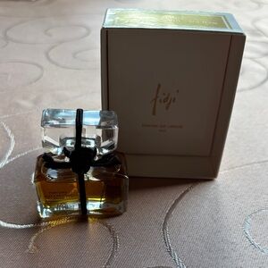 Vintage collectible bottle and box. FIDJI by Guy Laroche